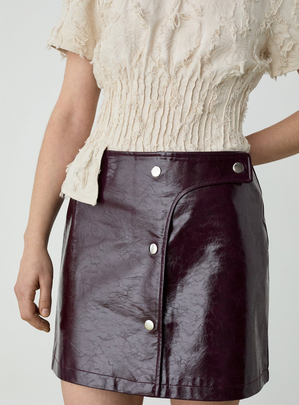 LENA PLUM SHORT SKIRT